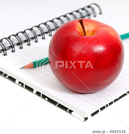 Notebook and apple 6893536