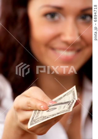 Young woman hand holding one dollar 6894718