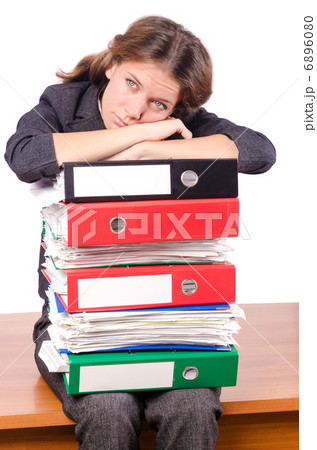 Businesswoman with lots of folders 6896080