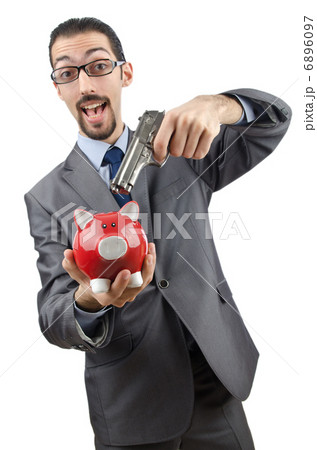 Businessman killing the piggy bank 6896097