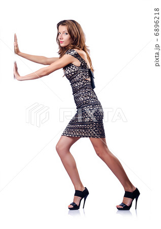 Young attractive woman pushing virtual obstacles 6896218