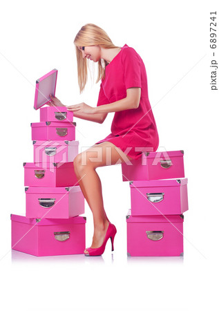 Woman with stack of giftboxes Woman with stack of giftboxes 6897241