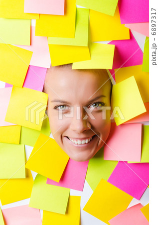 Woman with lots of reminder notes 6897317