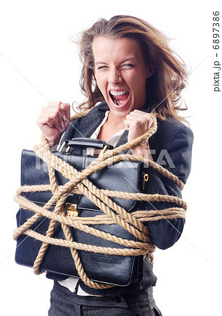 Businesswoman tied with rope on white 6897386
