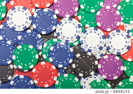 Background from of Multicolored Poker Chips Background from of Multicolored Poker Chips 6898143