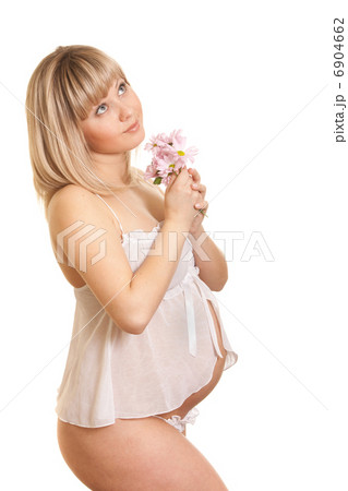 Young mother in white lingerie with flower isolated Young mother in white lingerie with flower isolated 6904662
