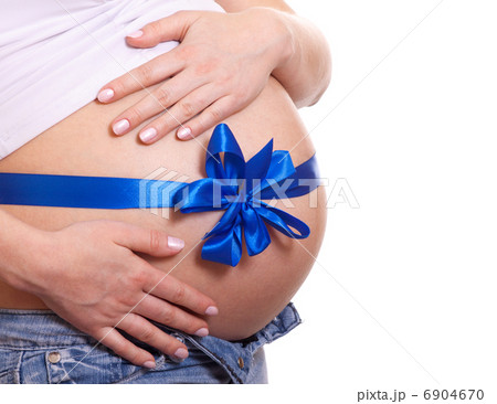 Pregnant woman hugs her belly isolated 6904670