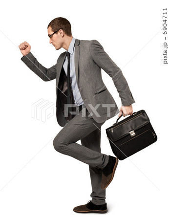 Man in a business suit with suitcase isolated 6904711