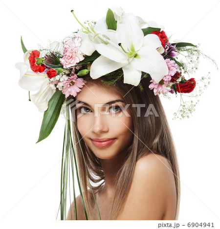 Beautiful woman with flower wreath 6904941