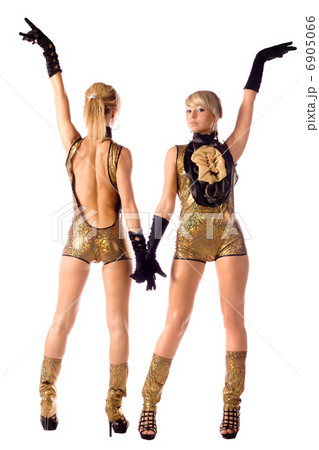 pretty go-go girls in gold costumes isolated 6905066