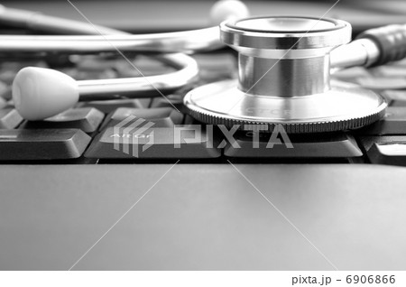 stethoscope and keyboard, as well as a place for your text 6906866
