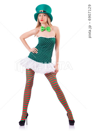 Young girl in saint patrick celebration concept Young girl in saint patrick celebration concept 6907129