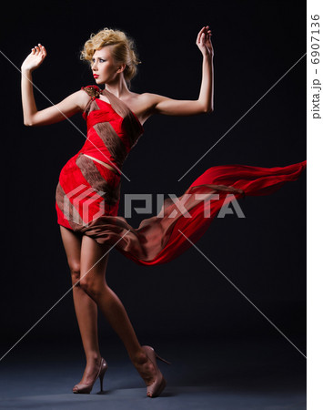 Woman in nice dress in studio 6907136