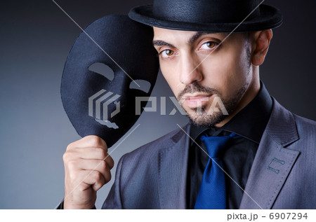 Man with black mask in studio Man with black mask in studio 6907294