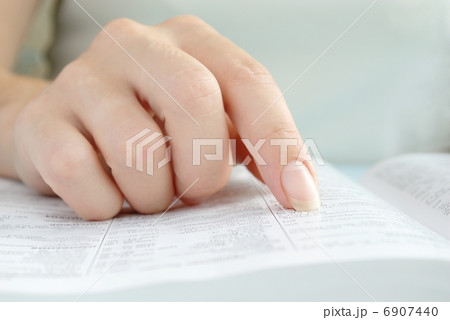 hand and a book hand and a book 6907440