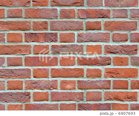 Brick wall background with red bricks 6907693