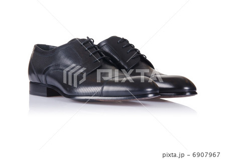Fashion concept with male shoes on white Fashion concept with male shoes on white 6907967