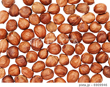 Hazelnuts background isolated on white. 6909946