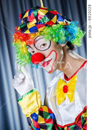 Funny clown in studio shooting 6910228