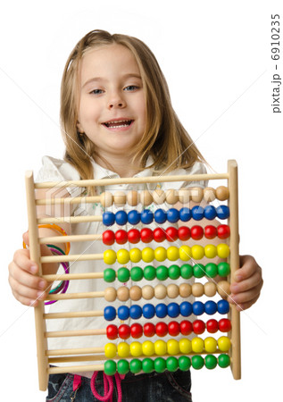 Girl with abacus on white 6910235