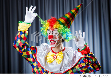 Funny clown in studio shooting 6910722