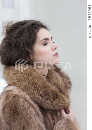 Love. Affectionate Dreamy Sensual Woman in Fur Coat in Reverie. Serene 6912361