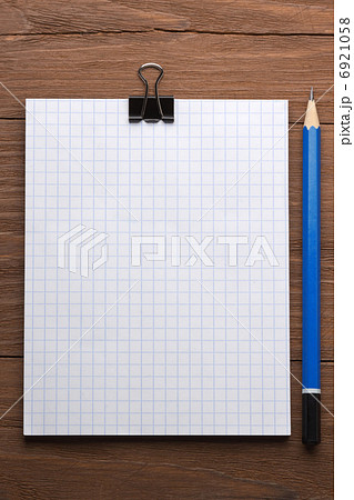 checked notepad and pencil checked notepad and pencil 6921058