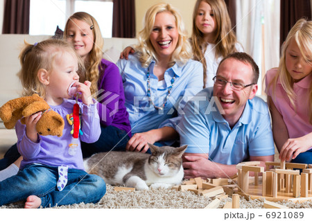 Family playing at home 6921089