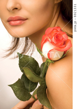 Woman with colorful flowers Woman with colorful flowers 6921331