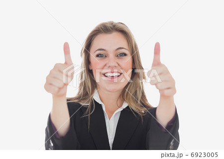 Happy business woman gesturing thumbs up 6923005