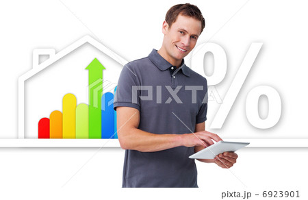 Smiling man using tablet 6923901