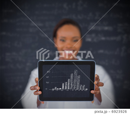 Woman holding a tablet 6923926