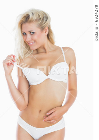 Young Woman Holding Bra Strap Stock Image - Image of lingerie