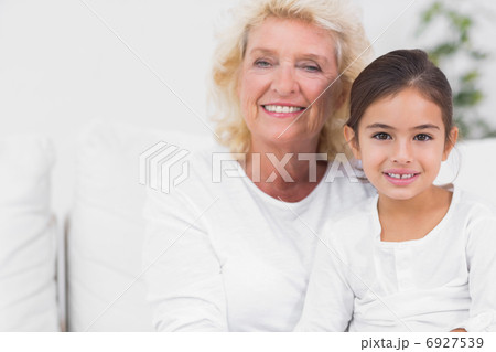 Cheerful granddaughter and grandmother portrait Cheerful granddaughter and grandmother portrait 6927539
