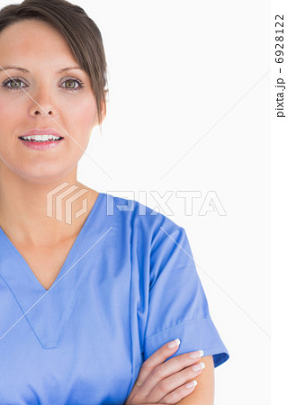 Portrait of smiling nurse with arms crossed Portrait of smiling nurse with arms crossed 6928122