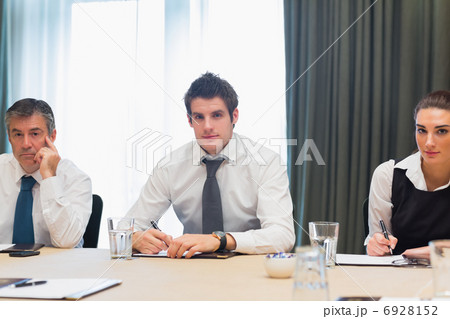 Smiling business people Smiling business people 6928152