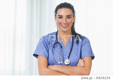 Happy nurse with arms crossed Happy nurse with arms crossed 6928229