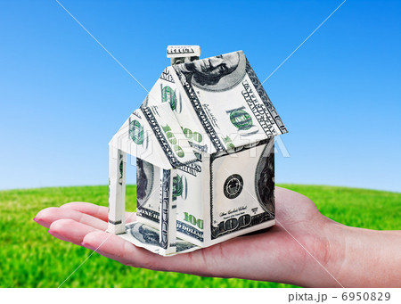 House made of money in hand House made of money in hand 6950829