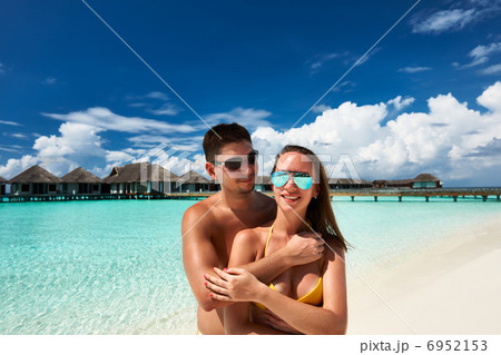 Couple on a beach at Maldives Couple on a beach at Maldives 6952153