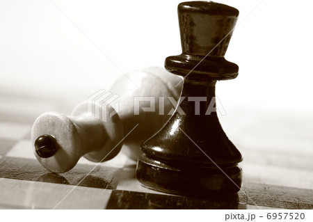 Wooden chessboard with chessmen Wooden chessboard with chessmen 6957520