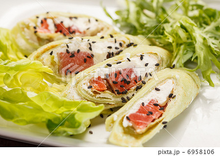 tasty appetizer with salmon and cheese 6958106