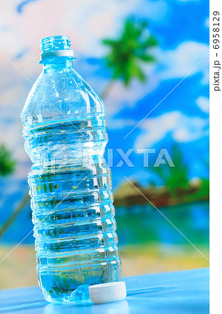 bottle of water on the beach bottle of water on the beach 6958129