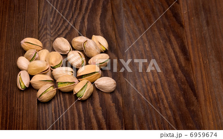 pistachios on  wooden  background 6959674