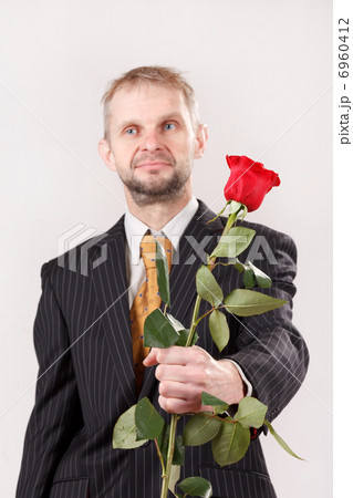 man with red roses 6960412