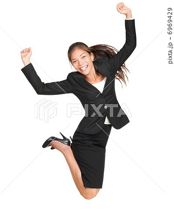 Celebrating businesswoman jumping 6969429