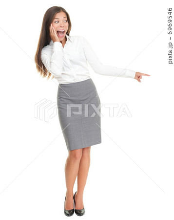 Surprised woman standing isolated Surprised woman standing isolated 6969546