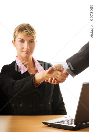 Business man and business woman making a treaty 6972089