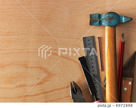 Tools on a wooden background 6972898