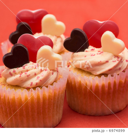 Close up of three valentines cupcakes 6974899