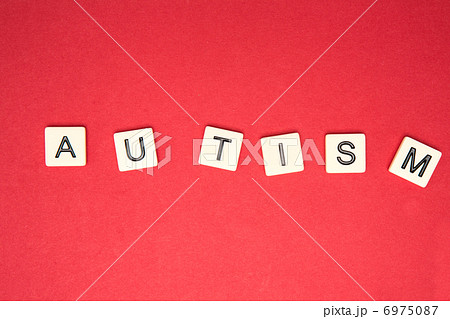 Autism spelled out in letter pieces 6975087